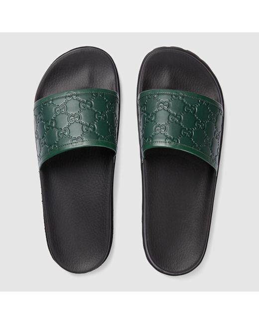 green gucci rubber slides
